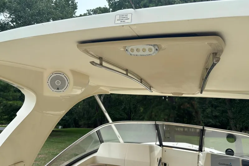 Slide: The Image of 2016 Scout 275 Dorado boat interior with speaker and lighting details. - 10