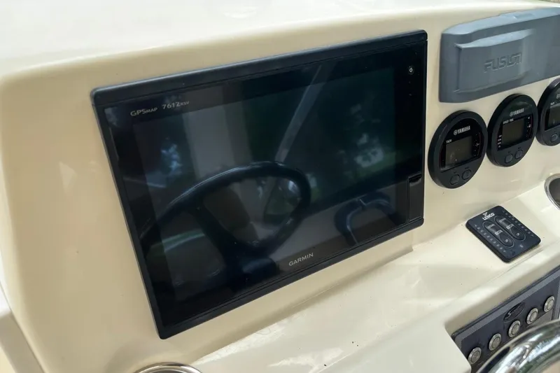 Slide: The Image of Garmin GPS display on 2016 Scout 275 Dorado boat dashboard with Yamaha gauges. - 13