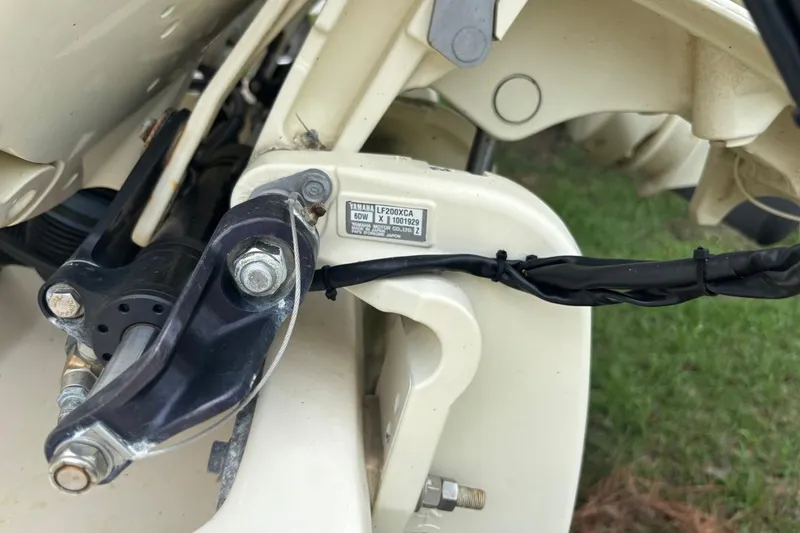 Slide: The Image of Close-up of 2016 Scout 275 Dorado boat engine components with visible wiring and labels. - 4