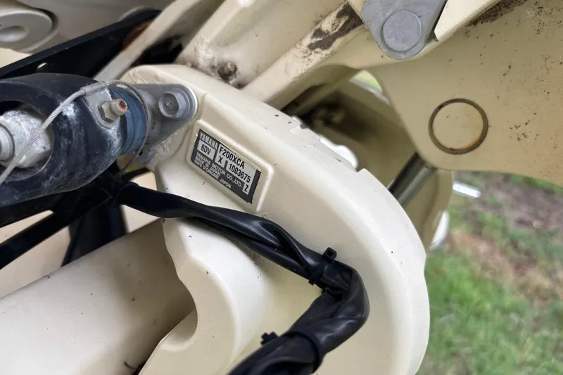 Slide: The Image of Close-up of a 2016 Scout 275 Dorado boat component with Yamaha F200XCA engine label. - 5