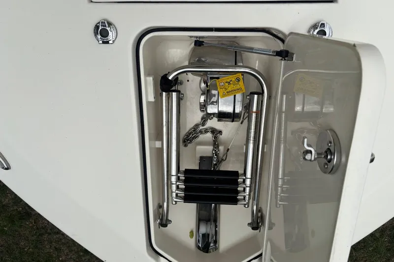 Slide: The Image of Anchor compartment of 2016 Scout 275 Dorado boat with stainless steel fittings. - 21
