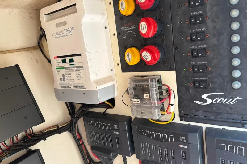 Slide: The Image of Electrical panel of a 2016 Scout 275 Dorado boat with ProNautic charger. - 19