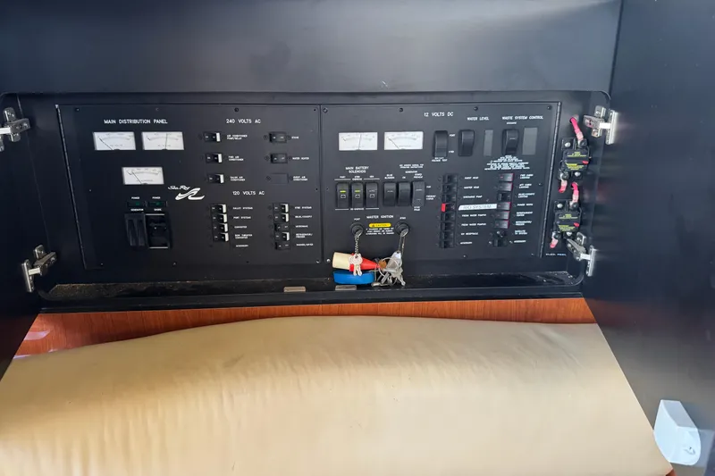 Slide: The Image of Electrical control panel on a 2003 Sea Ray 45 Express Bridge yacht. - 18