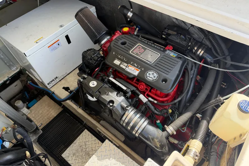 Slide: The Image of Engine compartment of a 2007 Regal Commodore 3760 IO with Volvo Penta engine and Kohler power system. - 48