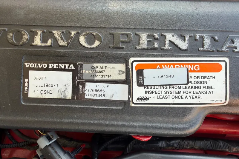 Slide: The Image of Volvo Penta engine label on 2007 Regal Commodore 3760 IO, showing specifications and warning. - 47