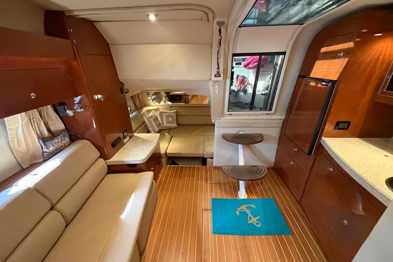 Slide: The Image of Luxurious interior of 2007 Regal Commodore 3760 IO yacht with elegant wood finishes. - 40