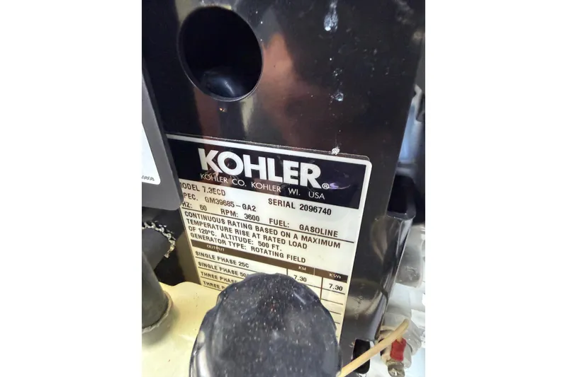 Slide: The Image of Kohler generator label on 2007 Regal Commodore 3760 IO, model 7.3ECD, gasoline-powered. - 50