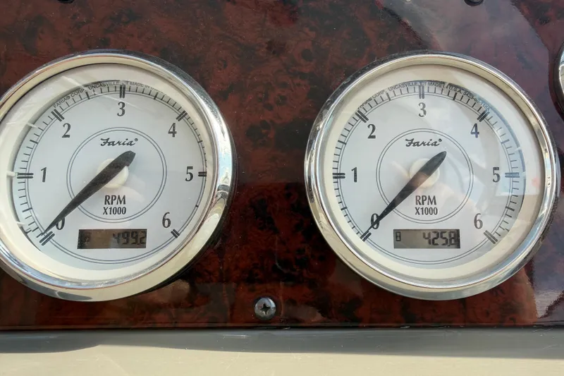 Slide: The Image of Close-up of Faria RPM gauges on a 2007 Regal Commodore 3760 IO boat dashboard. - 42