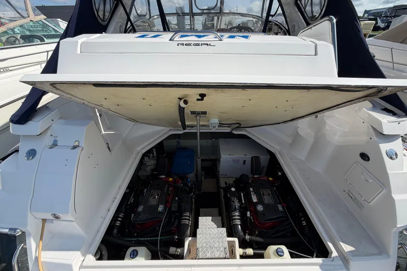 Slide: The Image of 2007 Regal Commodore 3760 IO boat engine compartment with dual engines visible. - 43
