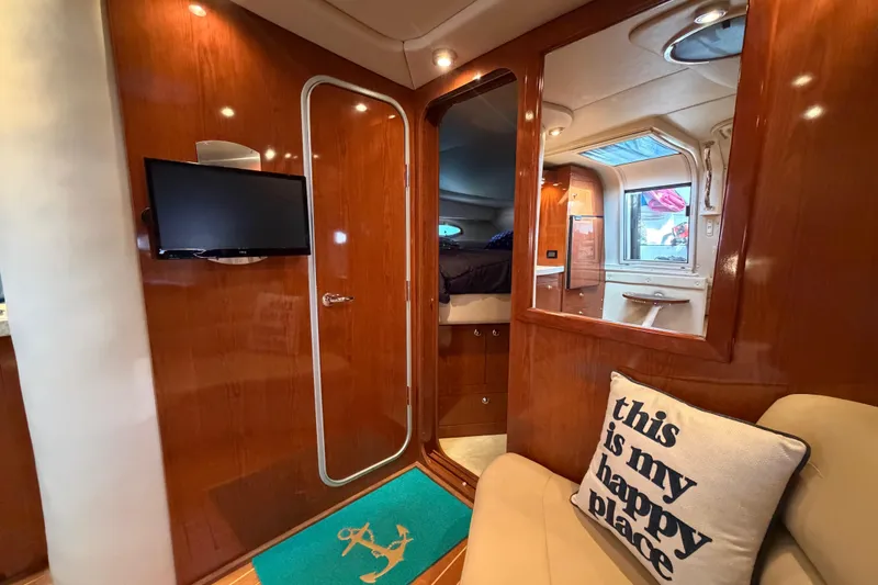 Slide: The Image of Interior of 2007 Regal Commodore 3760 IO yacht with cozy seating and modern amenities. - 34