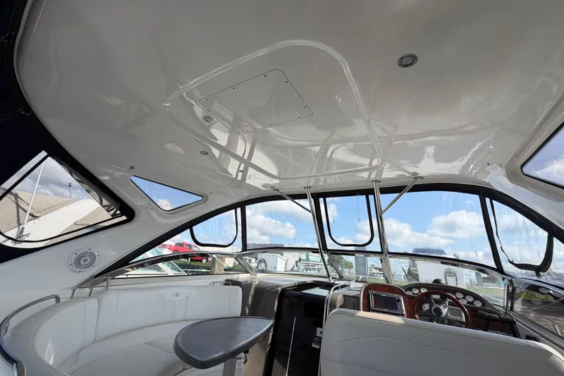 Slide: The Image of Interior view of 2007 Regal Commodore 3760 IO yacht, featuring sleek design and modern controls. - 18