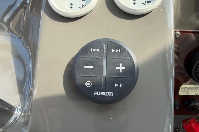 Slide: The Image of Audio control panel on 2007 Regal Commodore 3760 IO boat dashboard. - 25