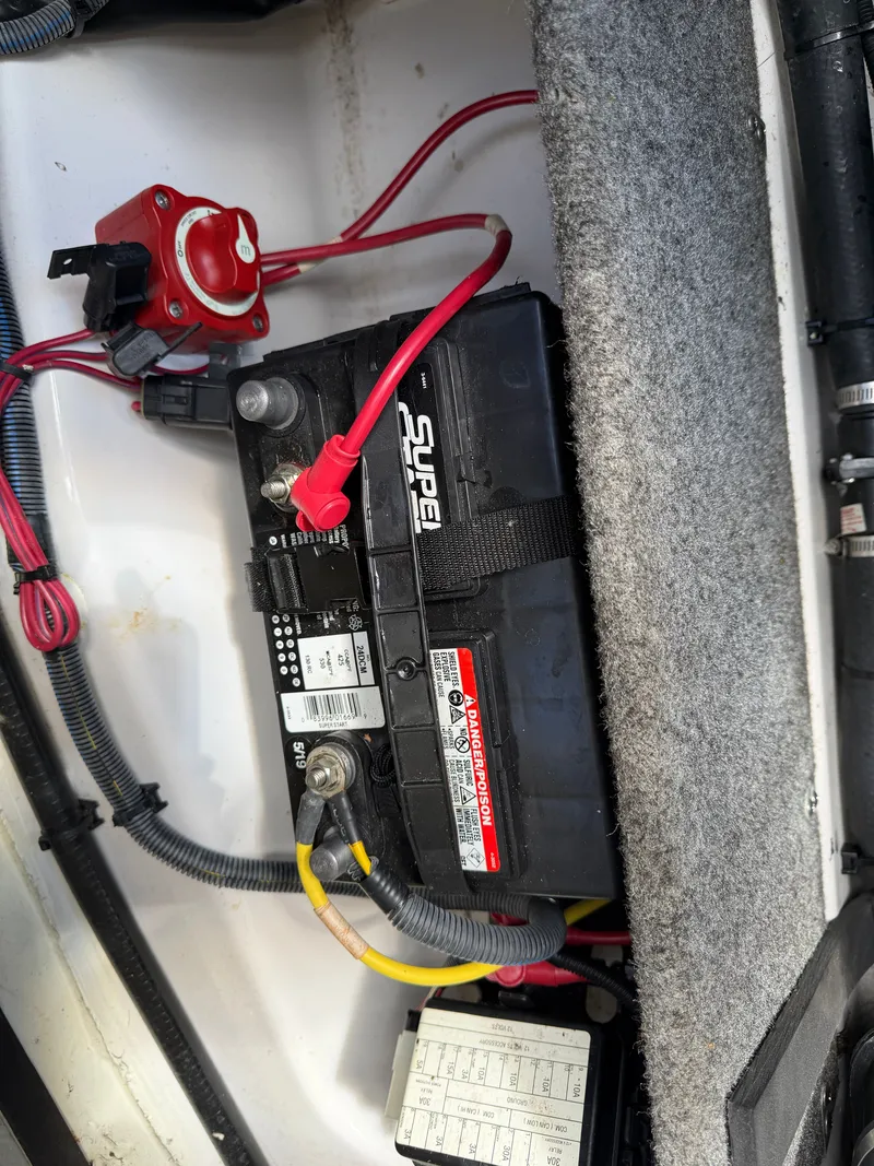 Slide: The Image of Battery and wiring inside a 2017 Scarab 165 boat. - 7