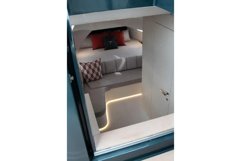 Slide: The Image of Luxurious interior of 2026 Kumbra 43 yacht with modern seating and ambient lighting. - 17