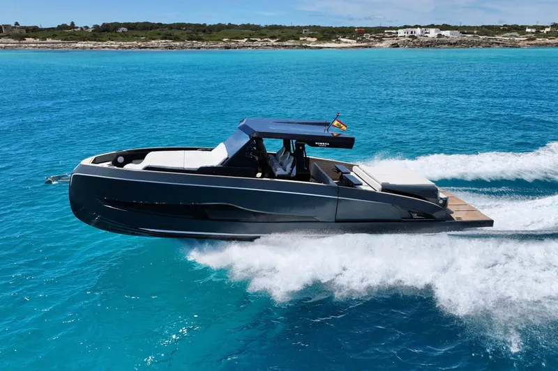 Slide: The Image of Modern Kumbra 43 yacht cruising on turquoise waters, 2026 model. - 1