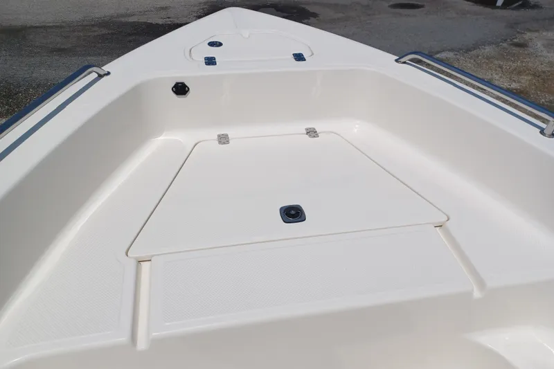 Slide: The Image of 2006 Key West 176 Sportsman CC boat deck with storage compartment. - 5