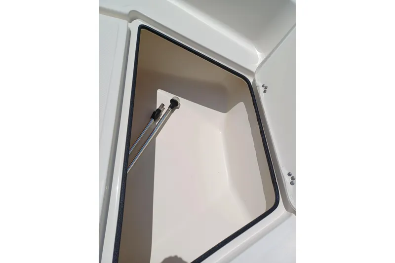 Slide: The Image of Open storage compartment on 2006 Key West 176 Sportsman CC boat. - 6