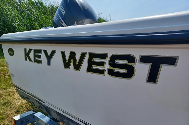 Slide: The Image of 2006 Key West 176 Sportsman CC boat with Yamaha engine, side view. - 14