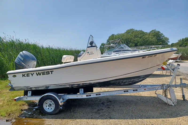 The Image of 2006 Key West 176 Sportsman CC boat on trailer, side view with Yamaha engine. - 0