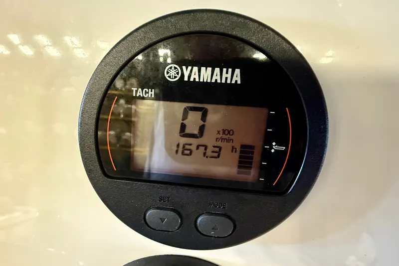 Slide: The Image of A Yamaha tachometer displays 167.3 operating hours. - 21