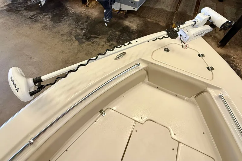 Slide: The Image of The image shows the bow of a Key West 219 FS boat with a Minn Kota trolling motor. - 10
