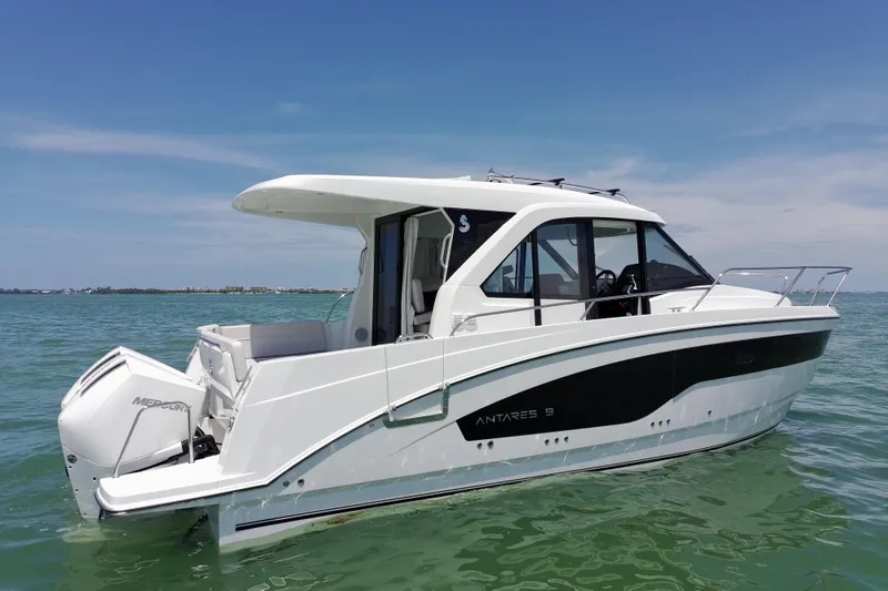 Slide: The Image of 2026 Beneteau Antares 9 V2 boat on calm sea under clear sky. - 10