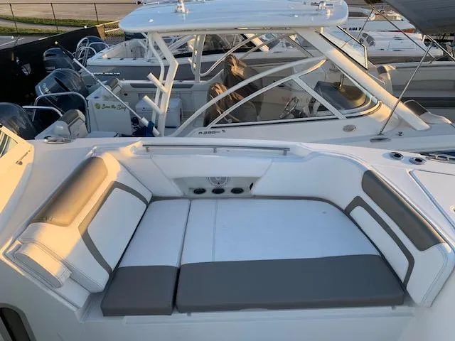 Slide: The Image of The image shows the cockpit of a 2019 World Cat 320 DC with comfortable seating. - 15