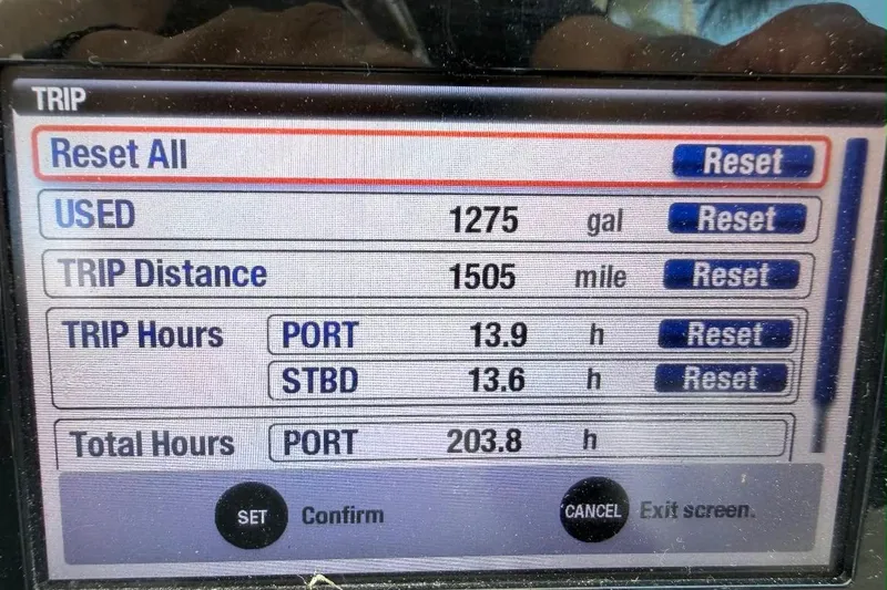 Slide: The Image of Display screen of 2019 World Cat 320 DC showing trip data and reset options. - 22