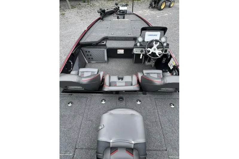 Slide: The Image of 2024 Nitro Z19 boat interior with steering console and seating, featuring a Lowrance display. - 6