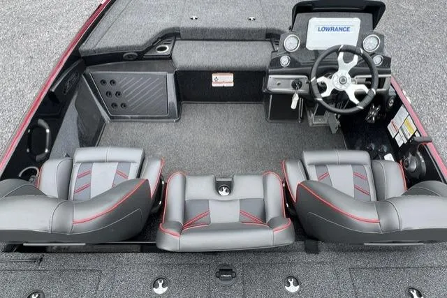 Slide: The Image of 2024 Nitro Z19 boat interior with steering wheel, seats, and Lowrance display. - 5