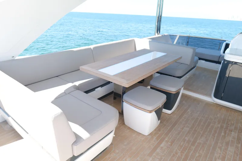 Slide: The Image of Luxurious seating area on 2022 Pearl 62 yacht with ocean view. - 46