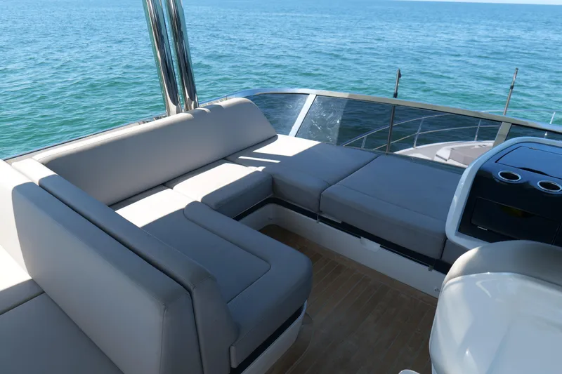 Slide: The Image of Luxurious seating area on 2022 Pearl 62 yacht with ocean view. - 52
