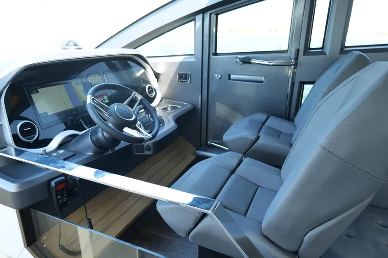 Slide: The Image of Modern helm of 2022 Pearl 62 yacht with sleek design and advanced navigation systems. - 20