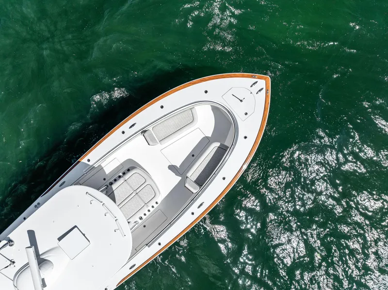 Slide: The Image of Aerial view of 2021 Valhalla Boatworks V-41 on green water. - 51
