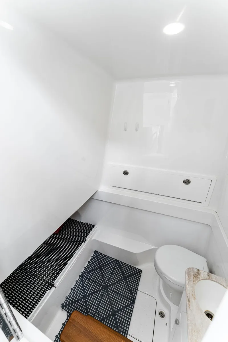 Slide: The Image of Interior of 2021 Valhalla Boatworks V-41 with toilet and storage. - 38