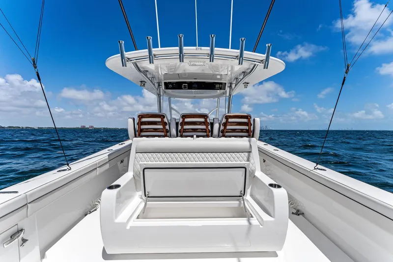 Slide: The Image of 2021 Valhalla Boatworks V-41 on open sea, featuring sleek seating and modern design. - 16