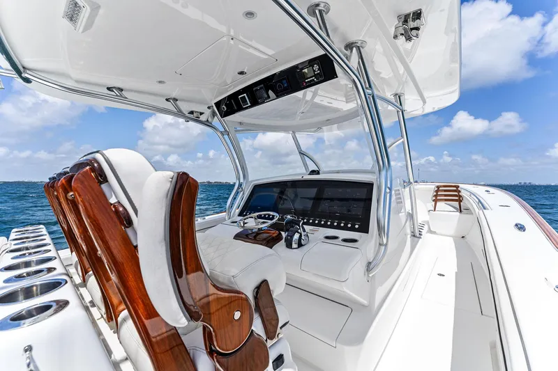 Slide: The Image of 2021 Valhalla Boatworks V-41 helm with luxurious seating and advanced navigation system. - 25