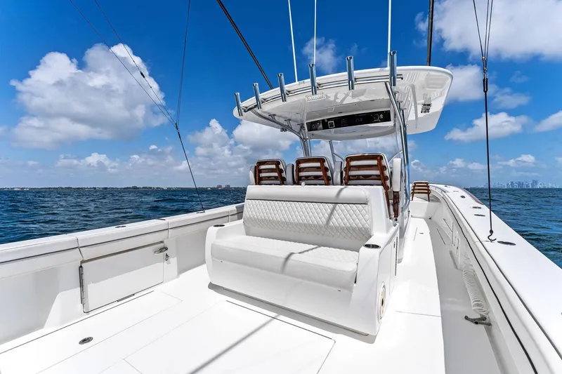 Slide: The Image of 2021 Valhalla Boatworks V-41 on open water, featuring sleek seating and modern design. - 17