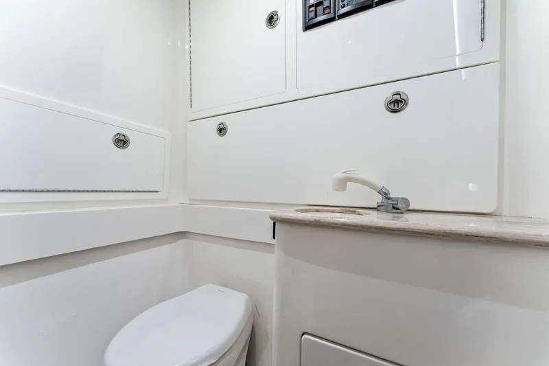 Slide: The Image of Interior of 2021 Valhalla Boatworks V-41 with toilet and sink. - 40