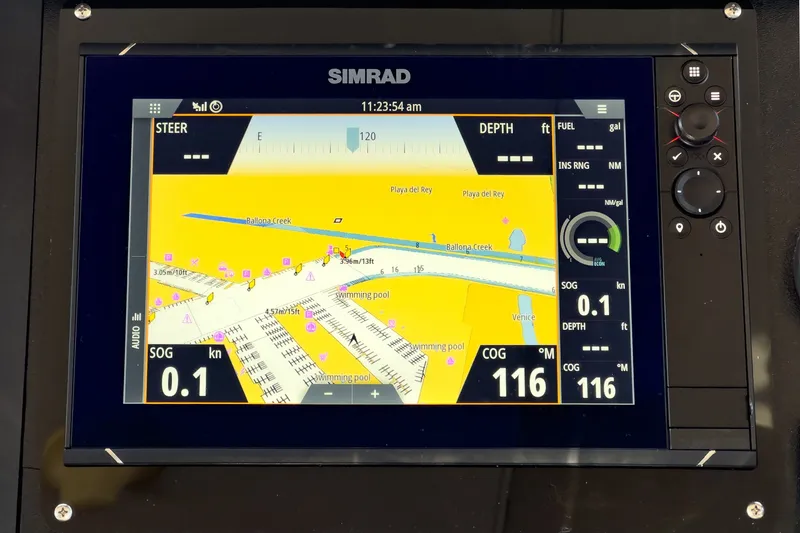 Slide: The Image of A Simrad navigation system displays a map with depth and speed information. - 30