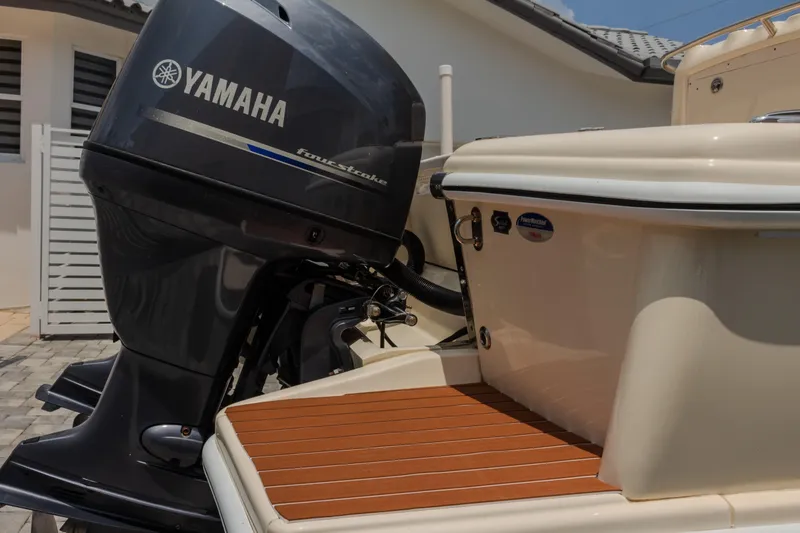 Slide: The Image of 2014 Scout 245 XSF boat with Yamaha four-stroke outboard motor. - 14