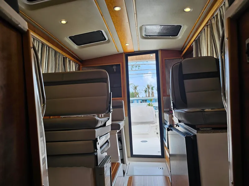 Slide: The Image of Interior of a 2021 Cutwater C-28 with modern seating and sleek design. - 20