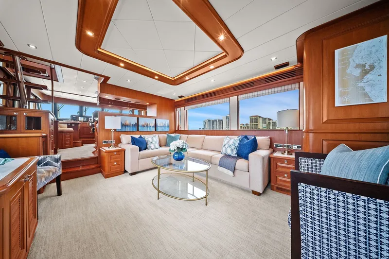 Slide: The Image of Luxurious 2015 Hampton Endurance yacht interior with elegant seating and panoramic windows. - 7