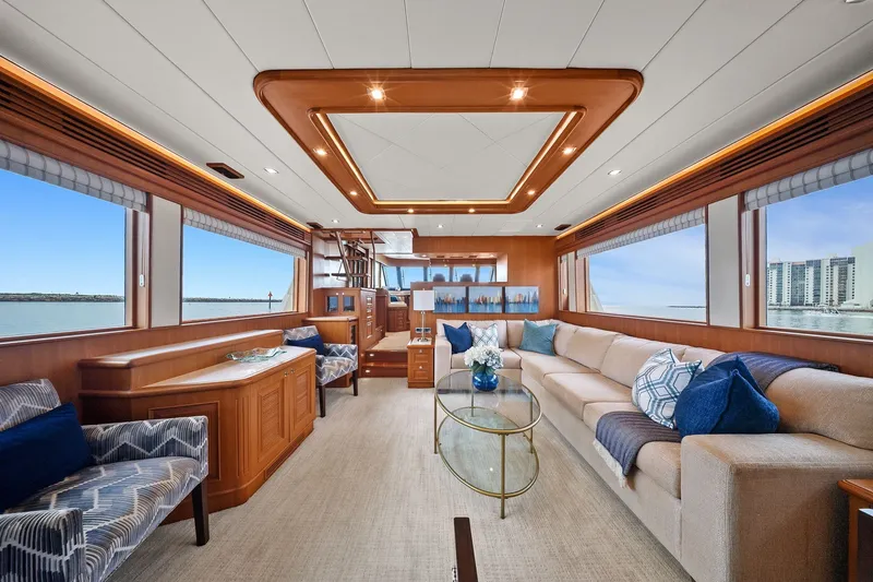 Slide: The Image of Luxurious interior of 2015 Hampton Endurance yacht with elegant seating and panoramic windows. - 8