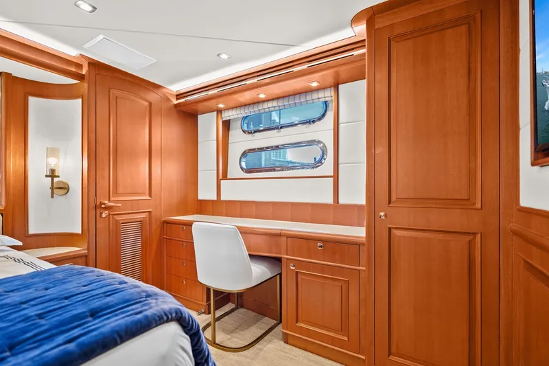 Slide: The Image of Luxurious wooden interior of 2015 Hampton Endurance yacht cabin with desk and chair. - 30