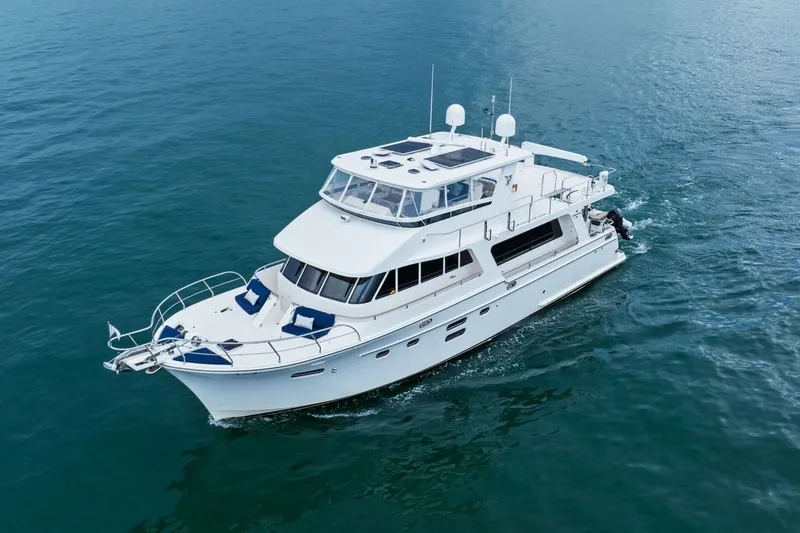 Slide: The Image of Luxury 2015 Hampton Endurance yacht cruising on open water. - 2