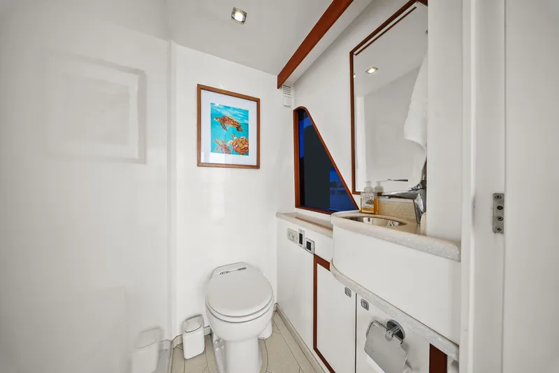 Slide: The Image of Luxurious yacht bathroom with modern fixtures, artwork, and elegant design. Hampton Endurance 2015 model. - 89