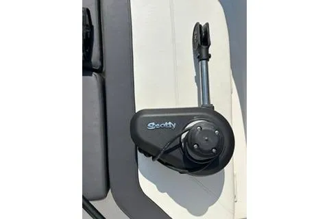 Slide: The Image of Bayliner 1703 Trophy 2023 boat accessory, featuring a mounted Scotty fishing rod holder. - 12