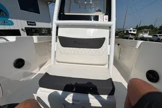 Slide: The Image of 2023 Bayliner 1703 Trophy boat interior with seating and storage compartments. - 9