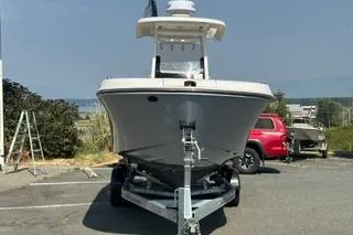 Slide: The Image of 2023 Bayliner 1703 Trophy boat on trailer in parking lot. - 25